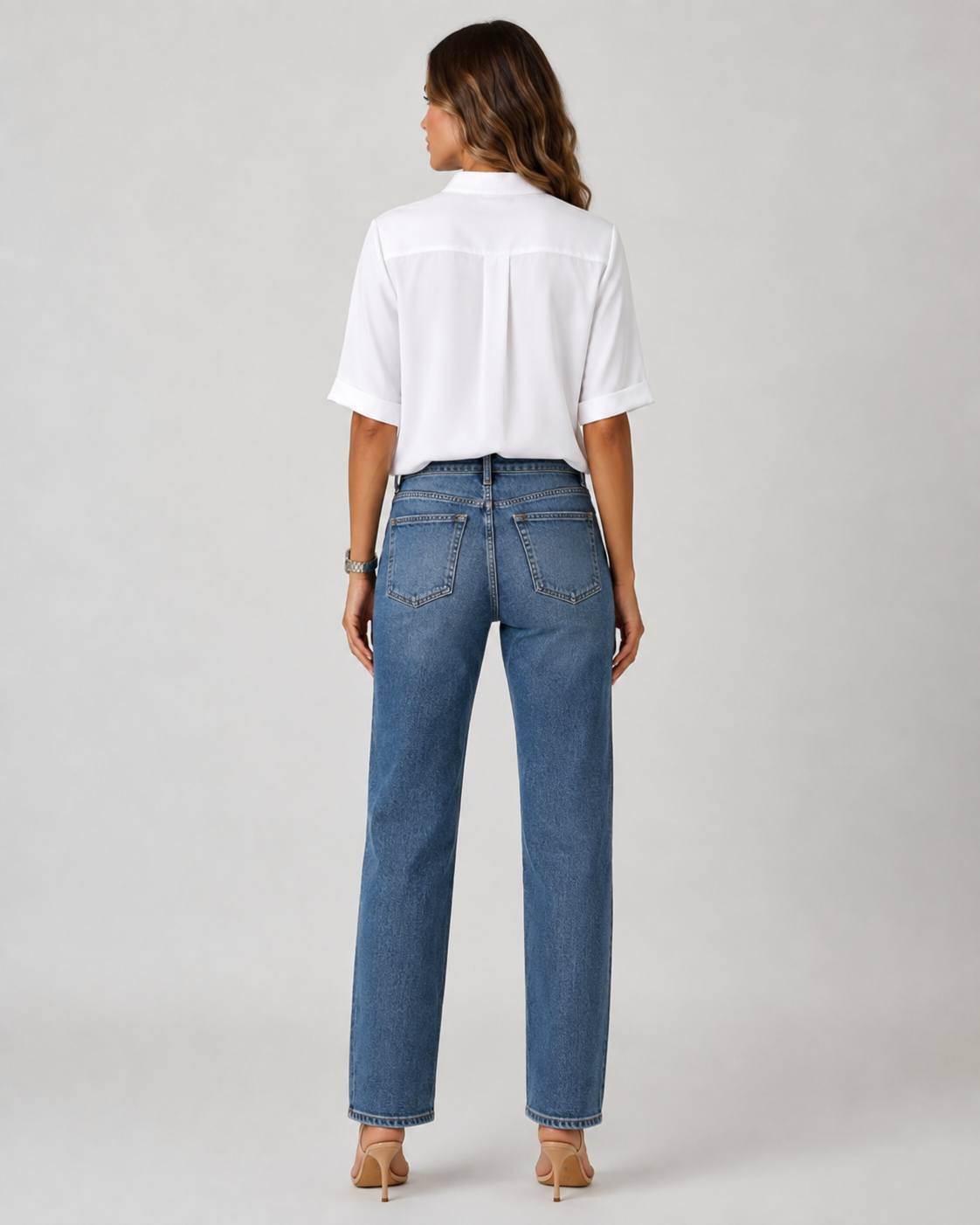 Elegant blouse with V‑neck and gold‑toned details