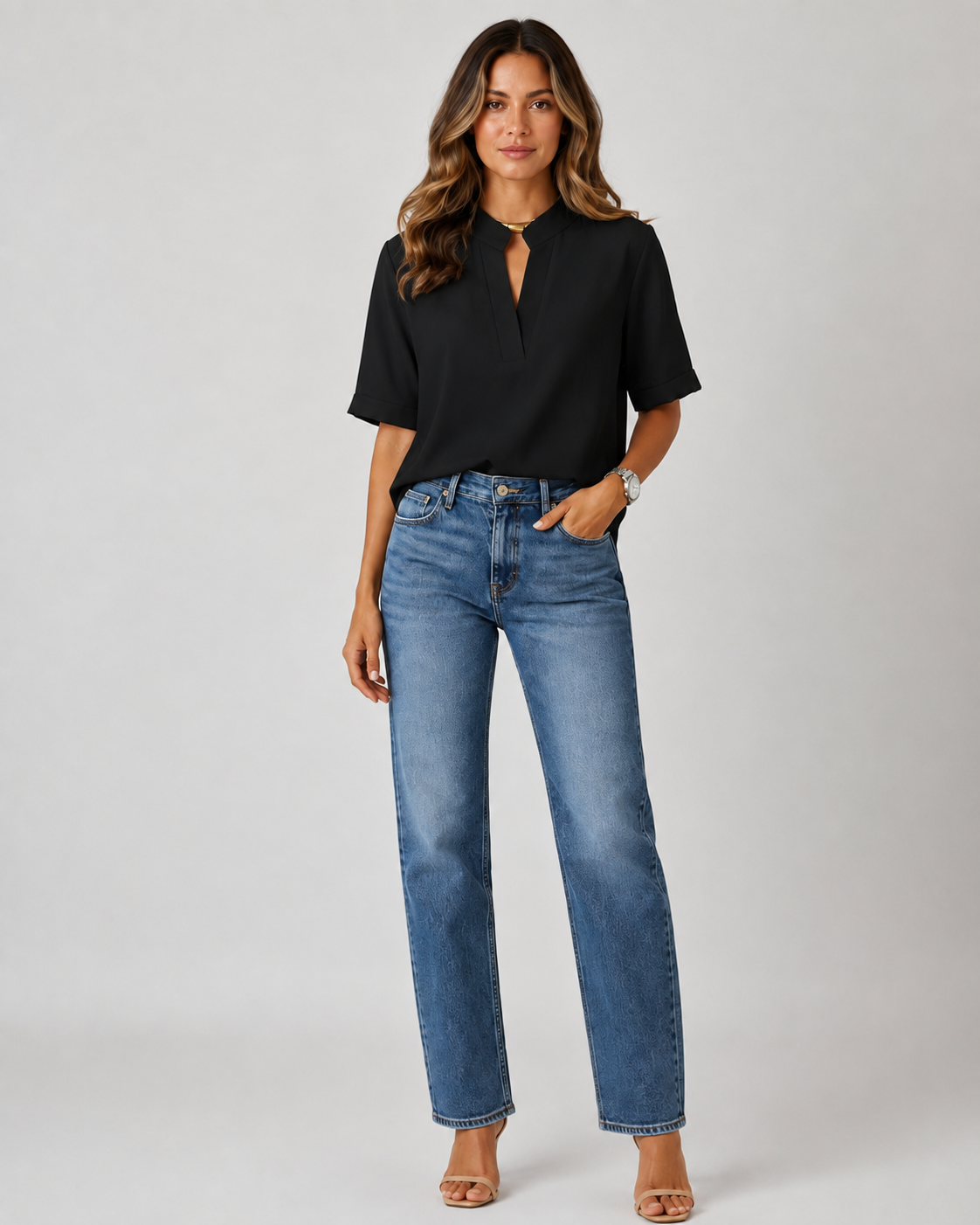 Elegant blouse with V‑neck and gold‑toned details